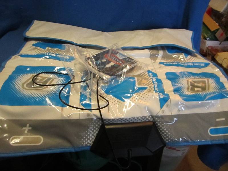lot 204 image: Wii dance pad and DVD...