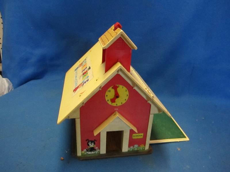 lot 209 image: Antique fisher price toy house...