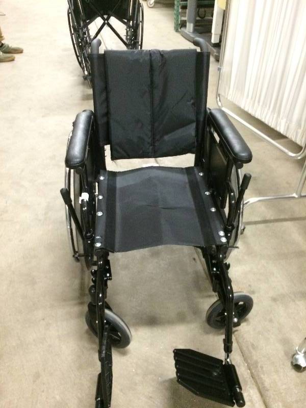 lot 63 image: Invacare Portable Collapsible Lightweight Wheelchair WOW Lots Of Extras On This Excellent Condition Mobile Chair  See Pictures