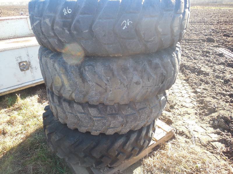 4 TIRES 14.00 X 24 WITH RIMS
