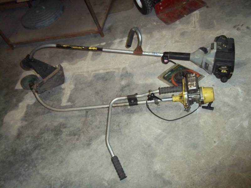 lot 40 image: Lot 0f 2 String Trimmers, 1 complete, 1 for parts, includes Rhino tuff head