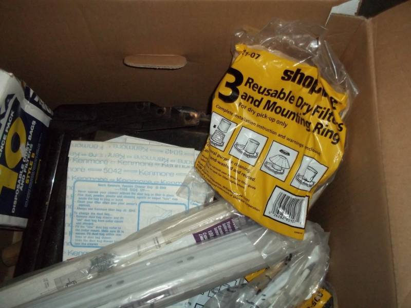 lot 124 image: Box of drawer guides and vac bags