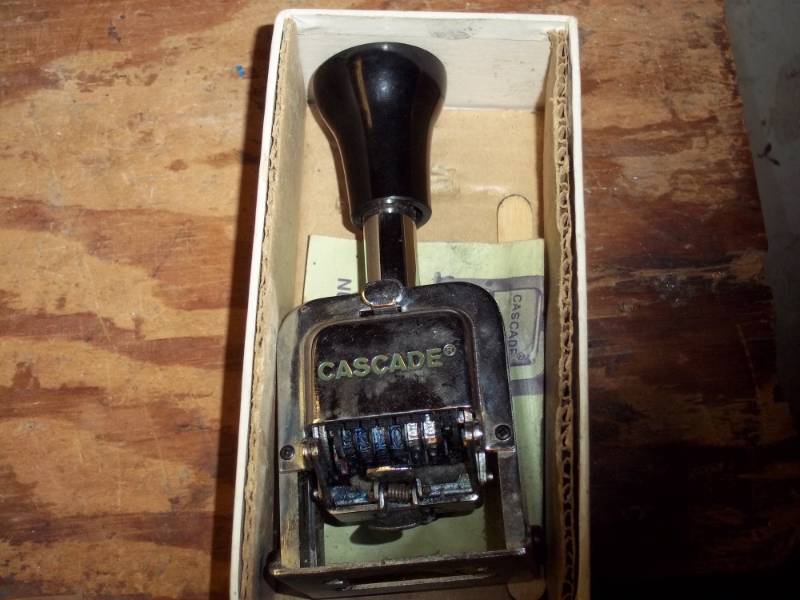 lot 179 image: Cascade Numbering machine in box