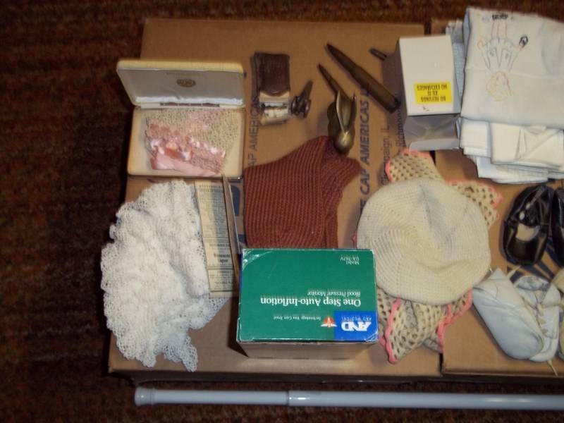 lot 231 image: Vintage baby shoes, dollies, dish towels, Knick Knacks, etcf