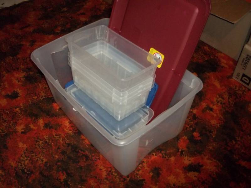 lot 253 image: Clear tote with lid includes small totes