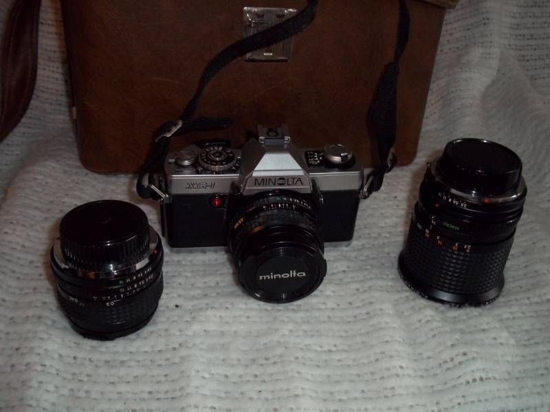 lot 300 image: Minolta XG-1 includes lenses, film and case
