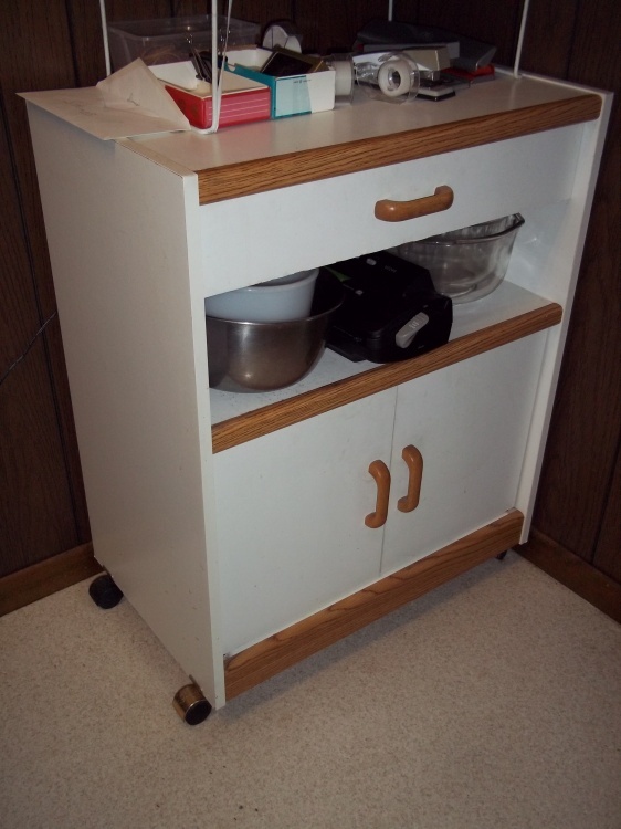 lot 335 image: Microwave Kitchen Cabinet on wheels does not include contents