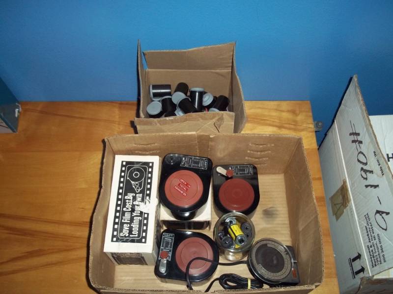 lot 398 image: Box of bulk film loaders with film canisters