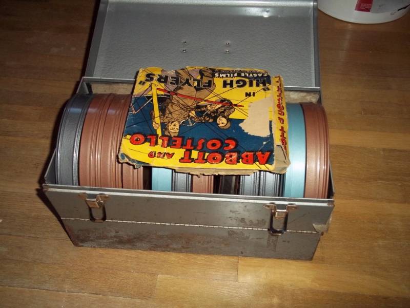 lot 408 image: Box of 16mm silent movies with case