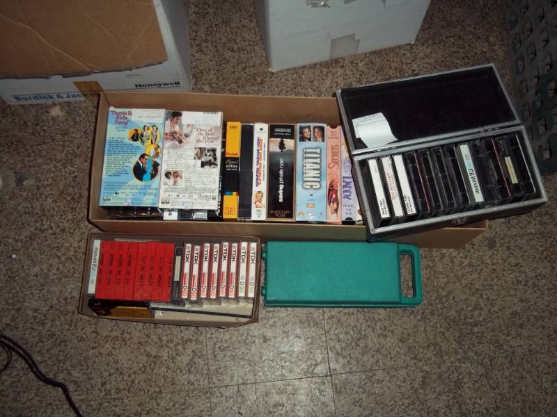 lot 432 image: Box of VHS Tapes and cassettes