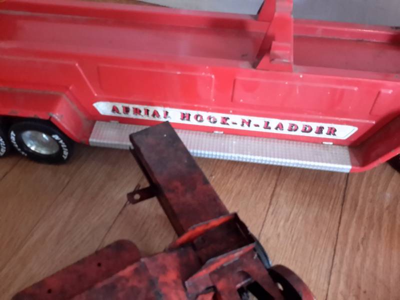 lot 39 image: NYLINT Aerial Hook n Ladder Truck, True Scale Bailer, other car parts