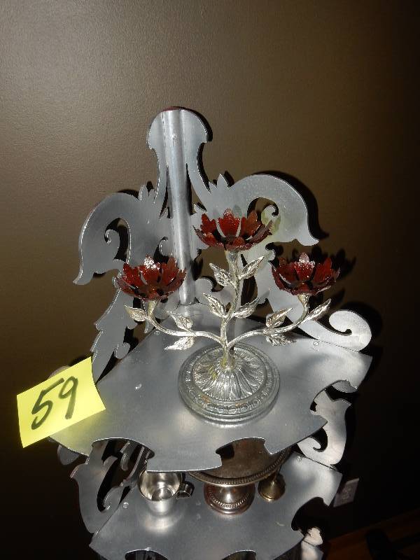 lot 59 image: Corner decorative shelf with intricate design.. Lion head legs