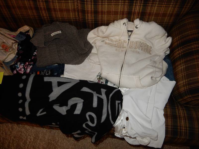 lot 66 image: Womens clothes and handbags as shown..