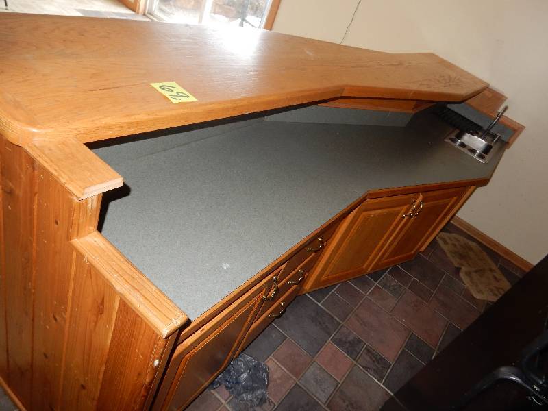 lot 69 image: Very nice Long BAR with lower shelf in back and sink..
