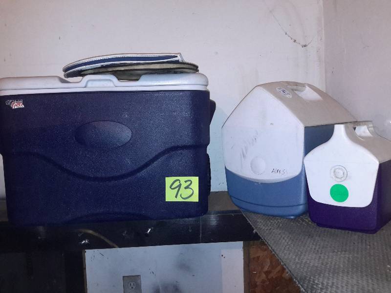 lot 93 image: 3 Coolers, 1 Coleman with pull handle, 2 smaller  3 folding chairs