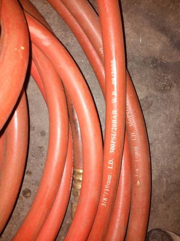 lot 123 image: Air Hose and lot of Funnels as shown