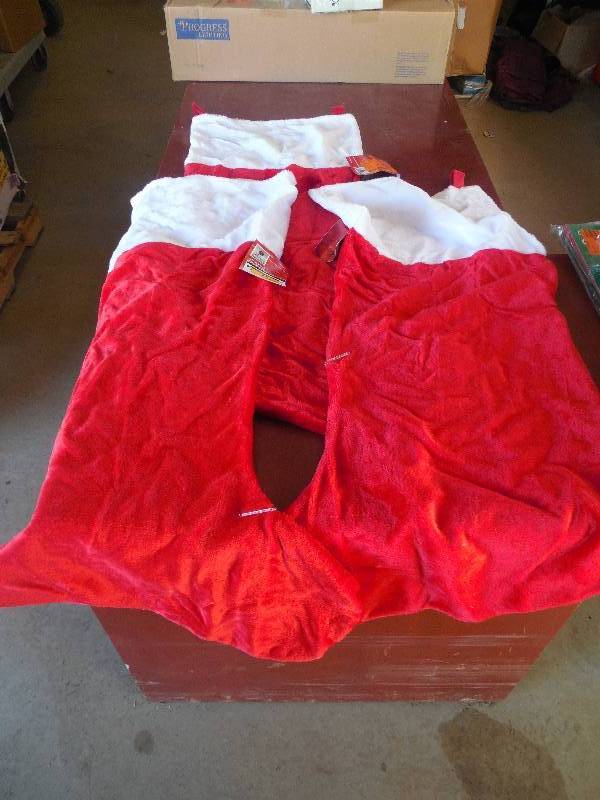 lot 33 image: (3) 48 PLUSH STOCKINGS