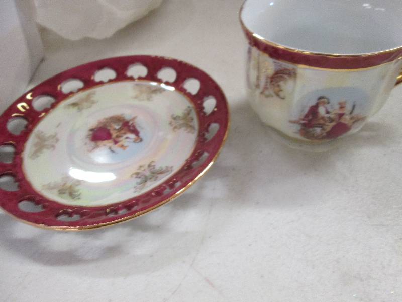 lot 14 image: 6 piece saucer and cup set of china...