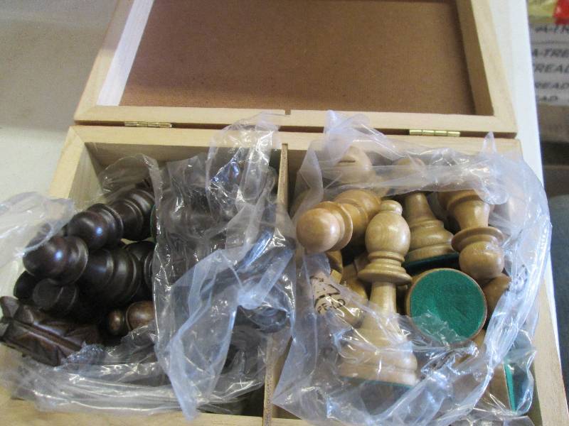 lot 18 image: box of chess pieces ...
