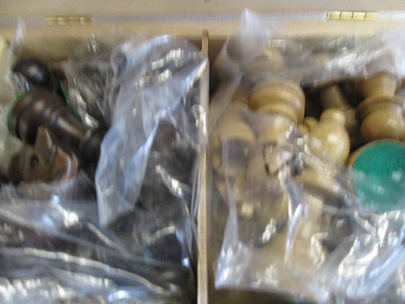 lot 19 image: box of chess pieces ...
