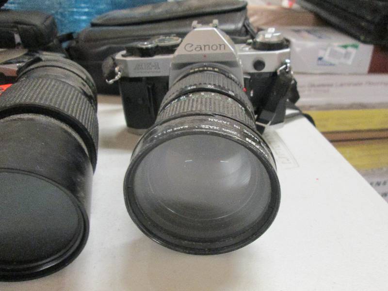 lot 26 image: lot of film cameras and 1 nikon coo...