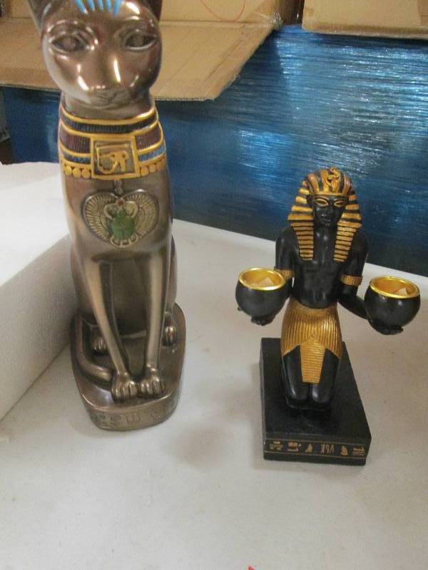 lot 31 image: 4 king tut candle holders and 1 egy...