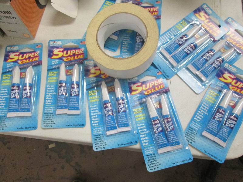 lot 44 image: 10 packages of devcon super glue an...