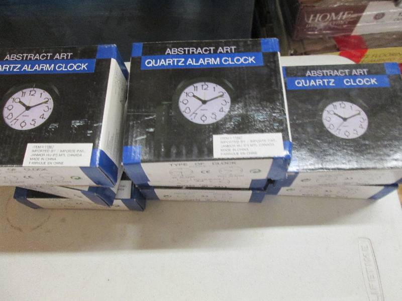 lot 52 image: 8 abstract art quartz clocks never ...