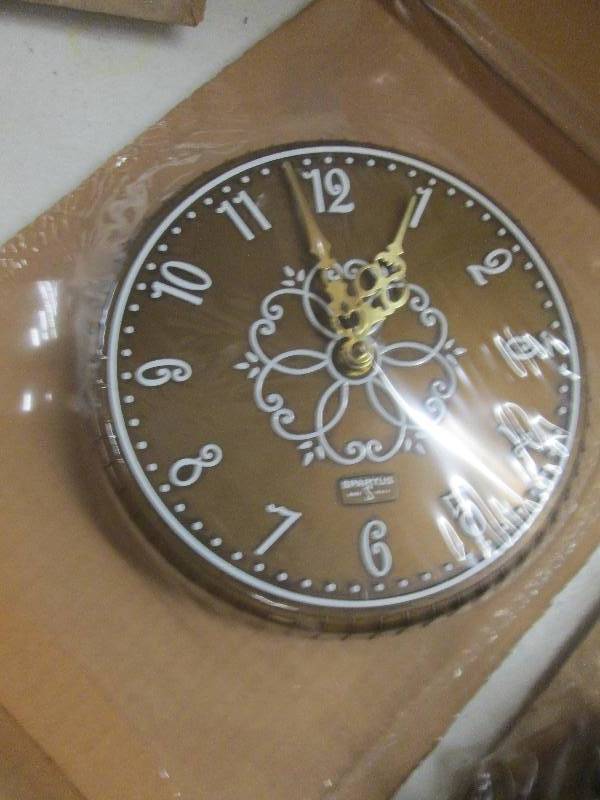 lot 73 image: sparatus clock never been opened ...