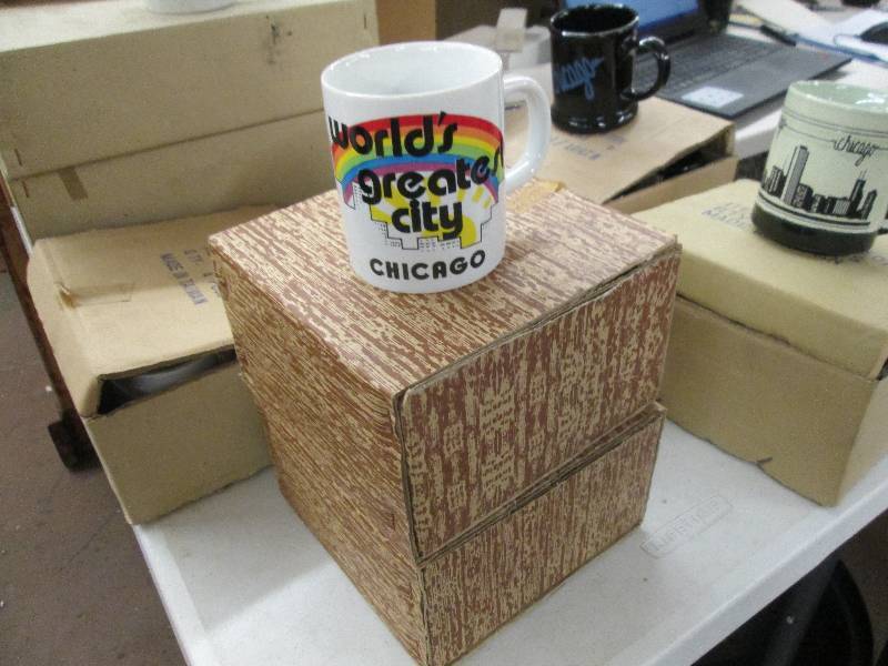 lot 142 image: box full of coffee cups ...