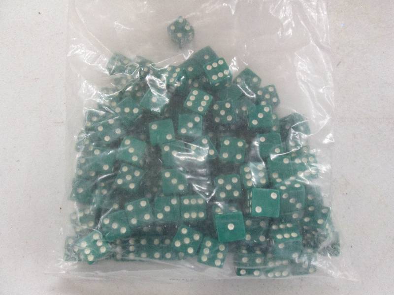 lot 154 image: 1 bag of green dice ...