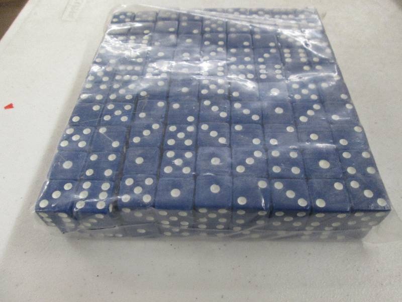 lot 163 image: 1 bag of blue dice never opened...