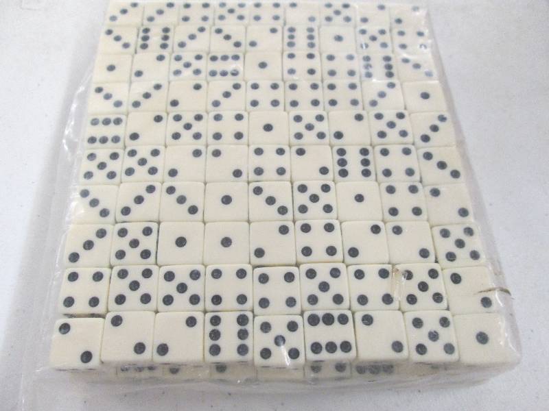 lot 164 image: 1 bag of white dice never opened ...