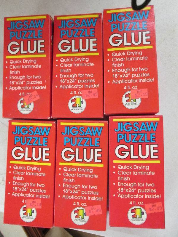 lot 326 image: 6 boxes of jigsaw puzzle glue brand...