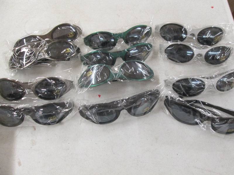 lot 344 image: 12 brand new pairs of sunglasses...