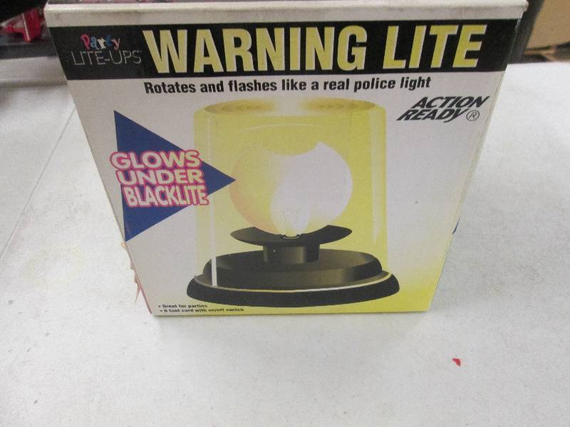lot 366 image: party light that glows under a blac...