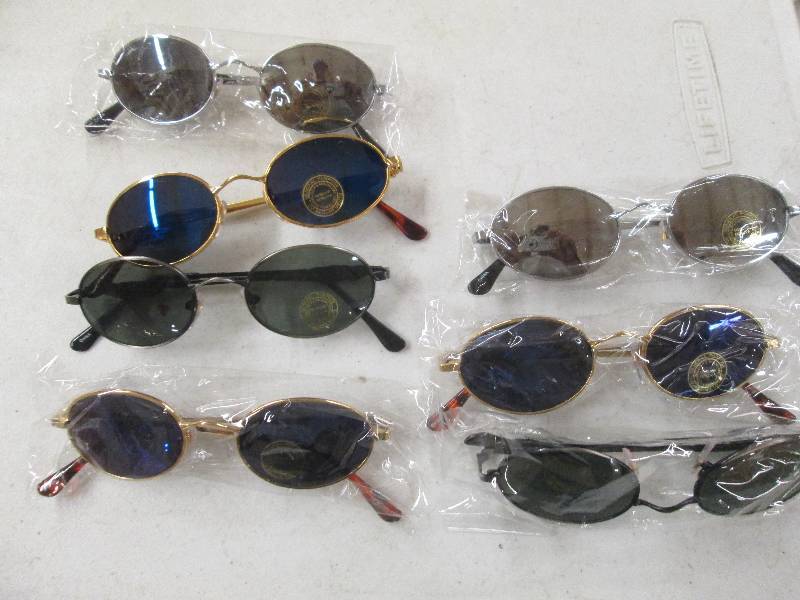 lot 376 image: 7 pairs of brand new sunglasses...