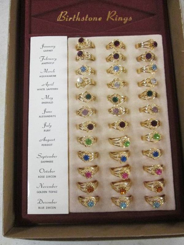 lot 396 image: 36 birthstone rings...