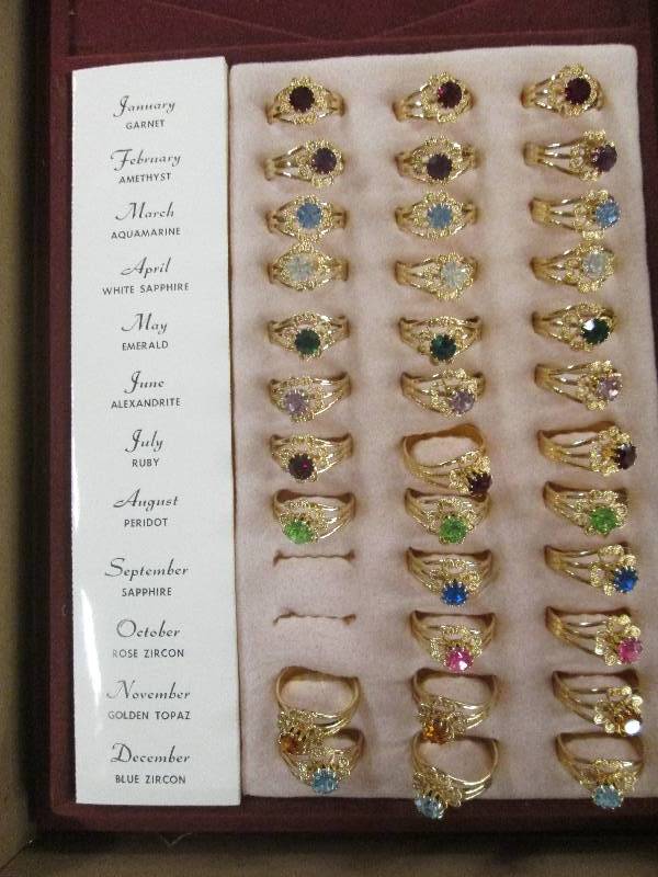 lot 397 image: 34 birthstone rings...