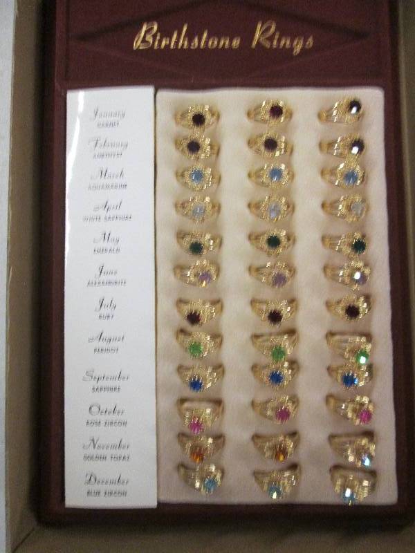 lot 398 image: 36 birthstone rings...
