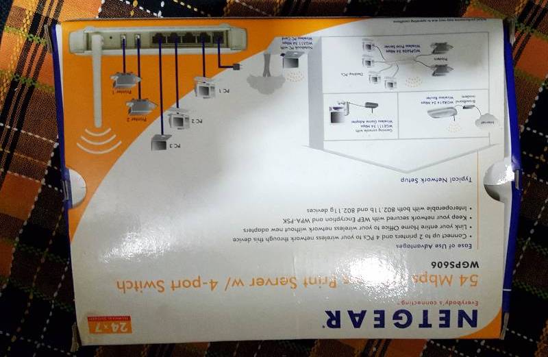 Netgear -54 MBPS print server w 4-port switch