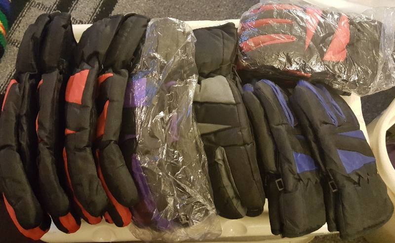 Large lot of unused mens and childs winter ski gloves