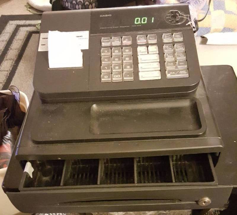 Used plug in cash register with drawer