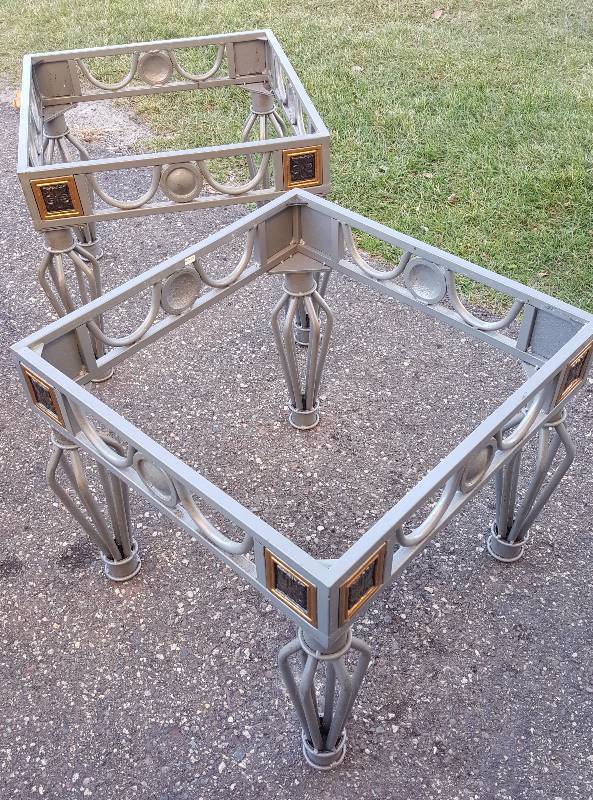 two metal end tables with glass top