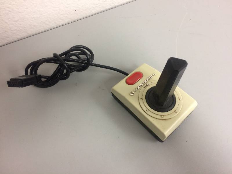 lot 53 image: Atari Commodore Joysticks and Light