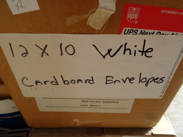 lot 12 image: 12 x 10 white cardboard envelopes