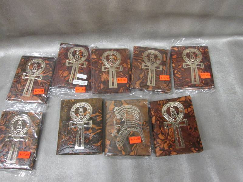 lot 11 image: Lot of 9 Made In Egypt Leather Addr...