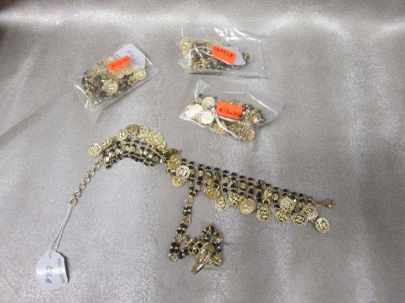 lot 23 image: Lot of 4 RingBracelet Combos Made ...