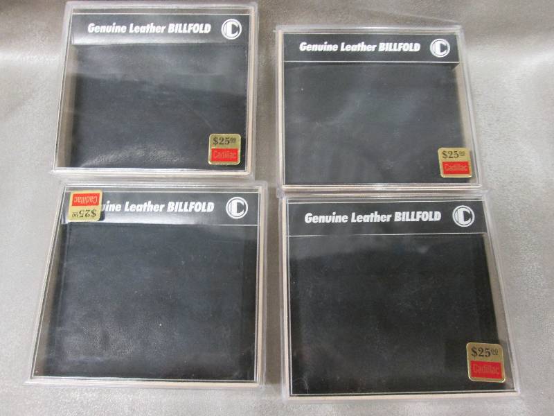 lot 59 image: Lot of 4 Black Leather Bifold Walle...