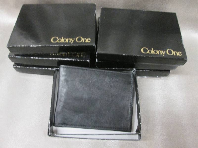 lot 62 image: Lot of 7 Black Leather Boxed Bifold...